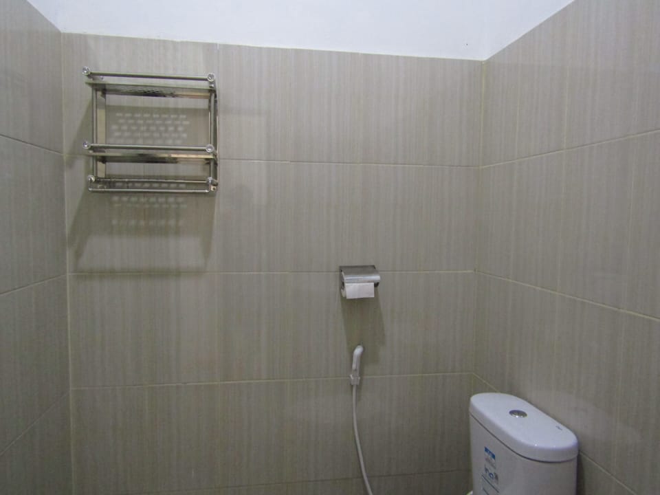 Standard Fan Room | Bathroom | Shower, free toiletries, slippers