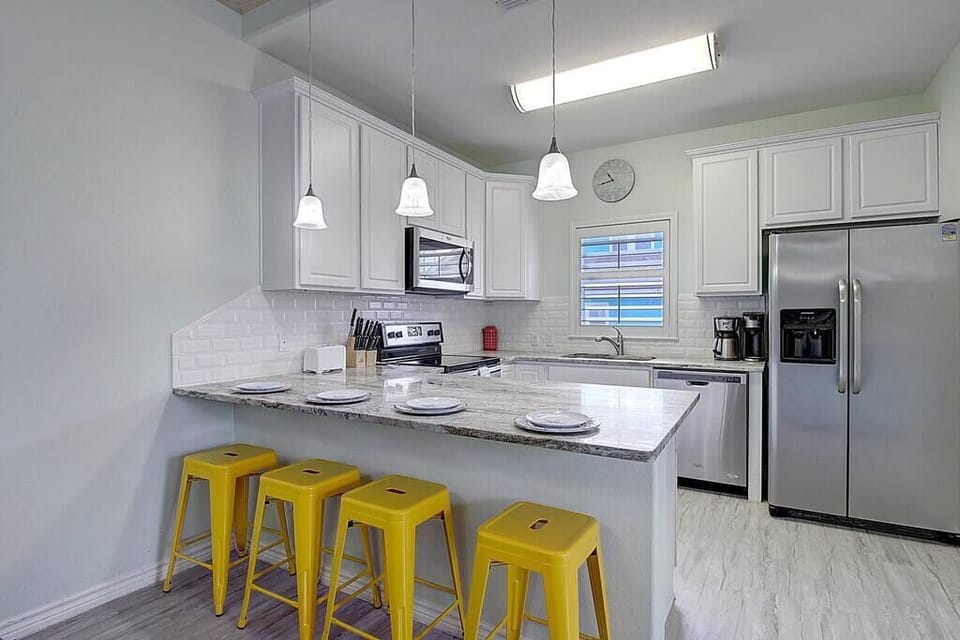 Explore culinary delights in our fully stocked kitchen, equipped with everything you need to whip up delicious meals and create lasting memories.