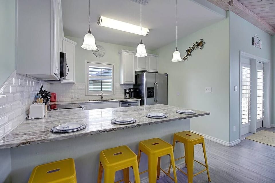 Explore culinary delights in our fully stocked kitchen, equipped with everything you need to whip up delicious meals and create lasting memories.