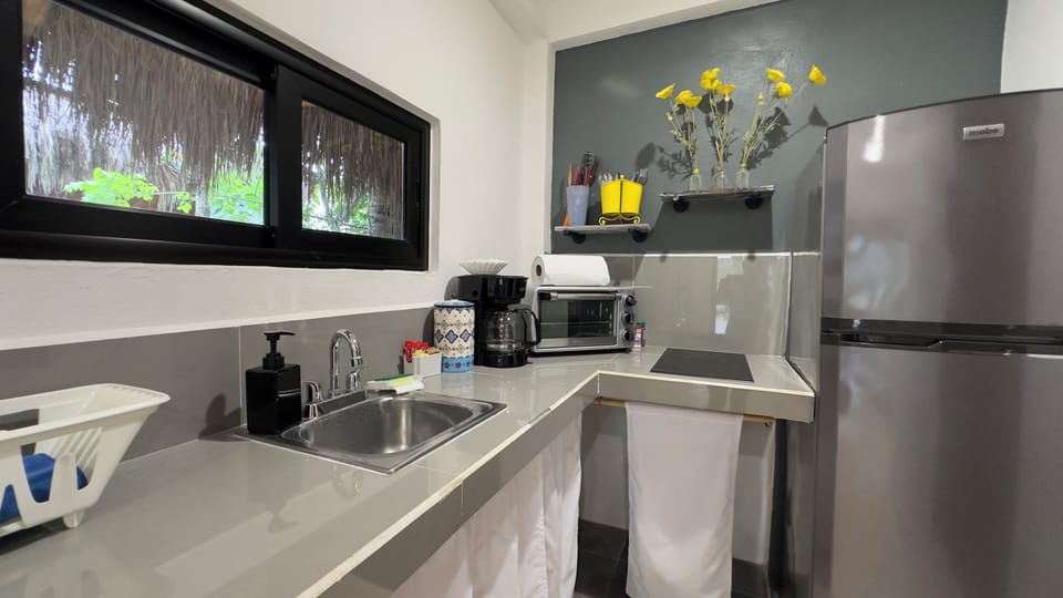 Kitchen with 2 burner stove, basic items for cooking