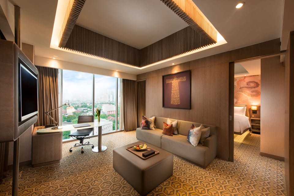 Suite, 1 Bedroom | Living area | 55-inch flat-screen TV with digital channels, TV, Netflix