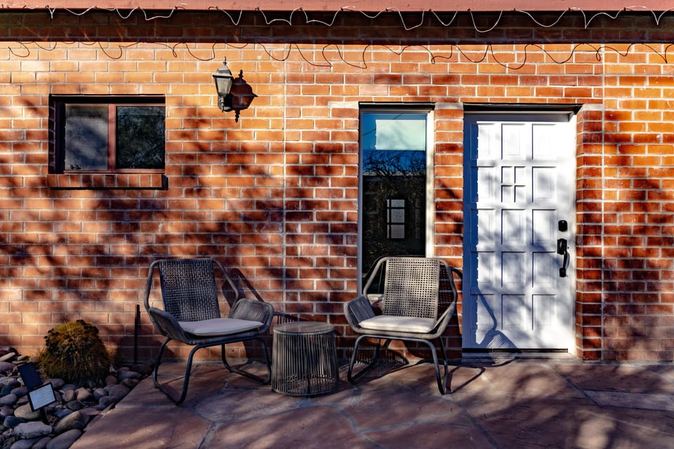 Patio seating at entrance to enjoy the sun all day