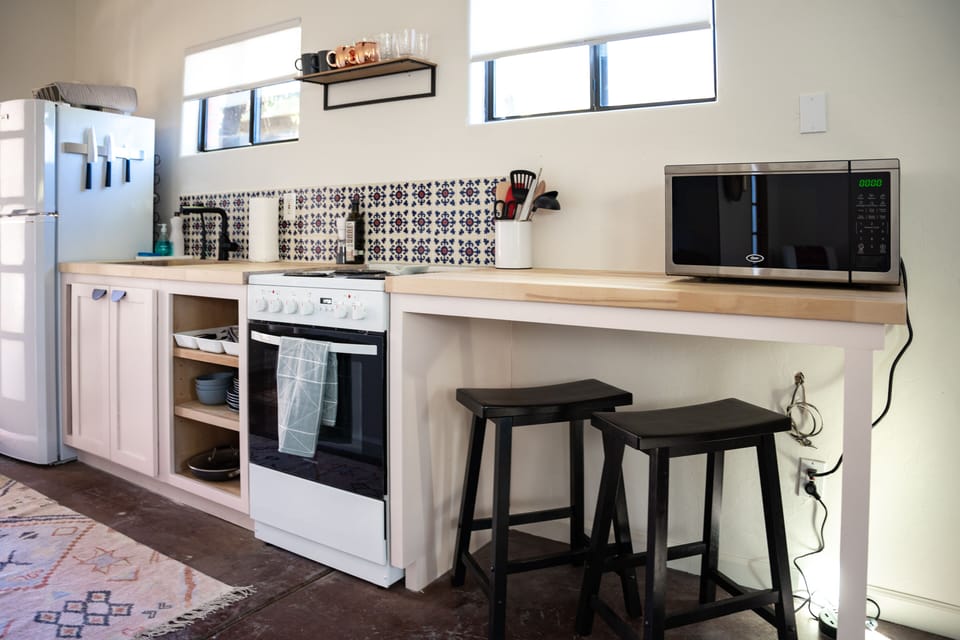 Full kitchen with dining and work space