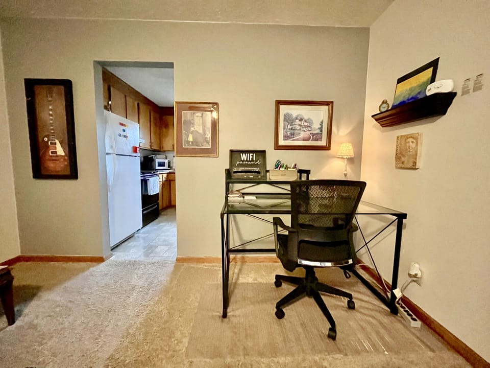 Desk area with view into kitchen