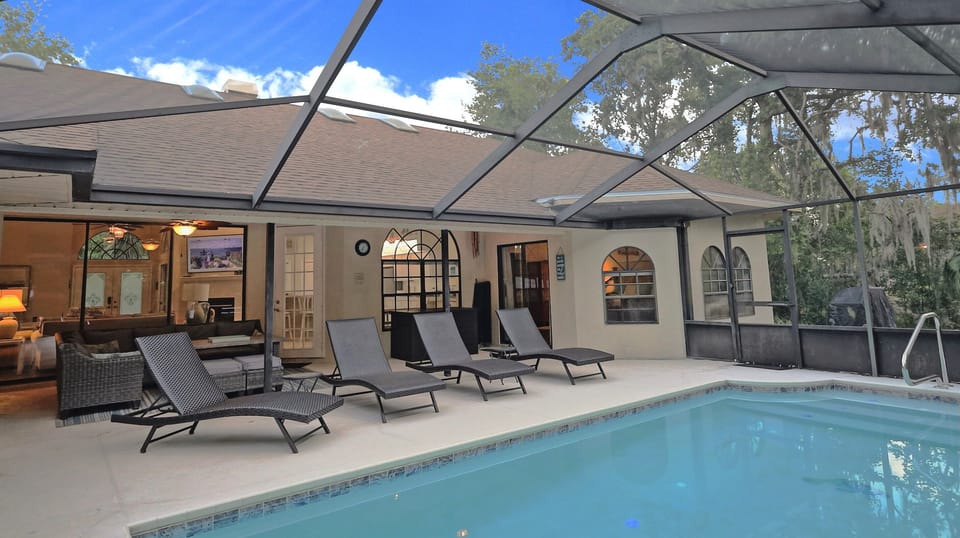 Private pool backing up to the woods