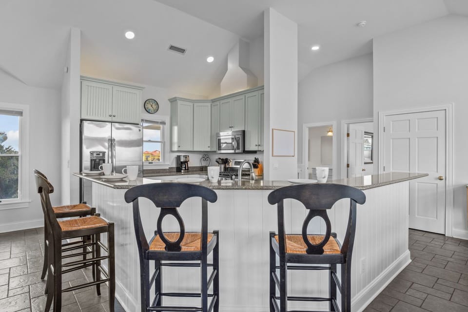 Whip up a delicious meal in the well-equipped kitchen with stainless steel appliances.