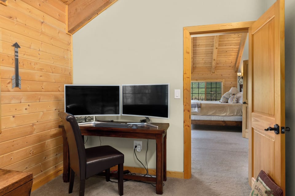 Office set up attached to the primary suite. Just bring your lap top!