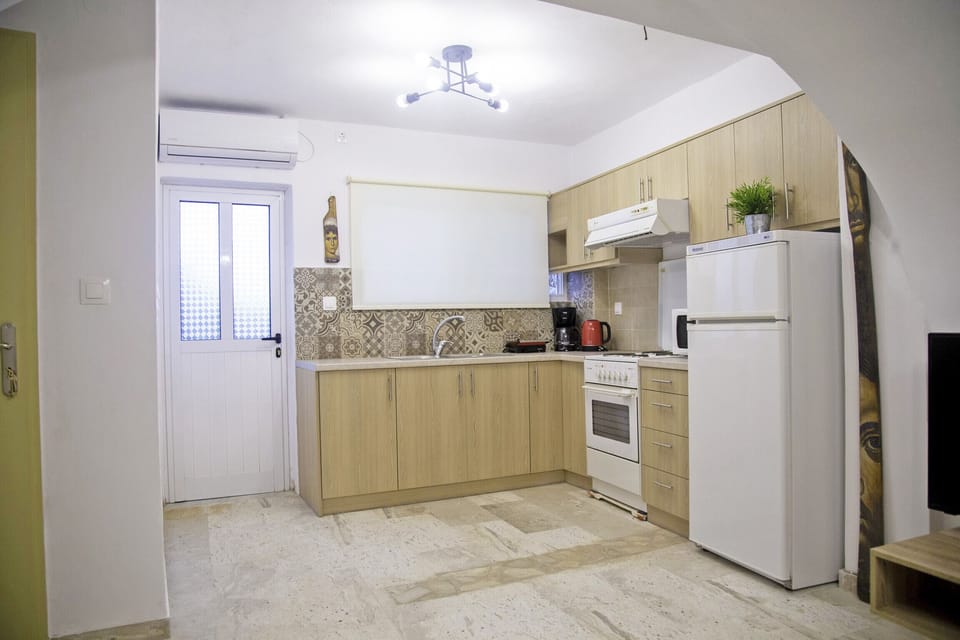 Kitchen of Cozy Apartment for 8,Areopoli,Mani,Near Amenities