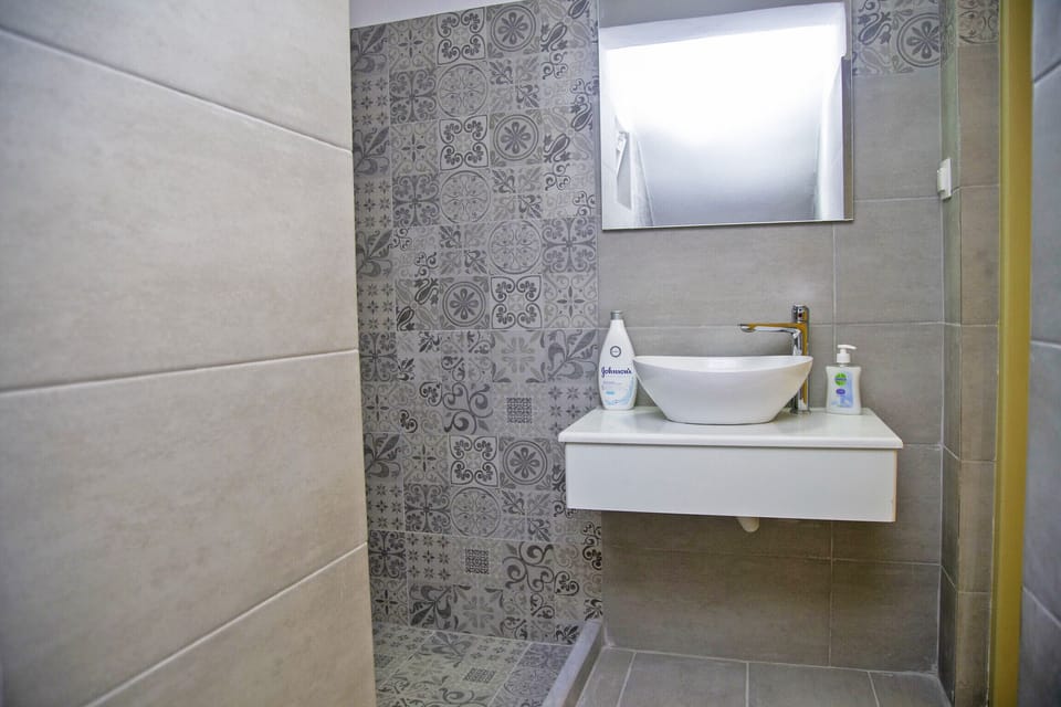 Bathroom of Cozy Apartment for 8,Areopoli,Mani,Near Amenities