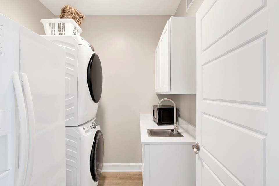 Full size washer/dryer, 2nd fridge, sink and microwave in the laundry room