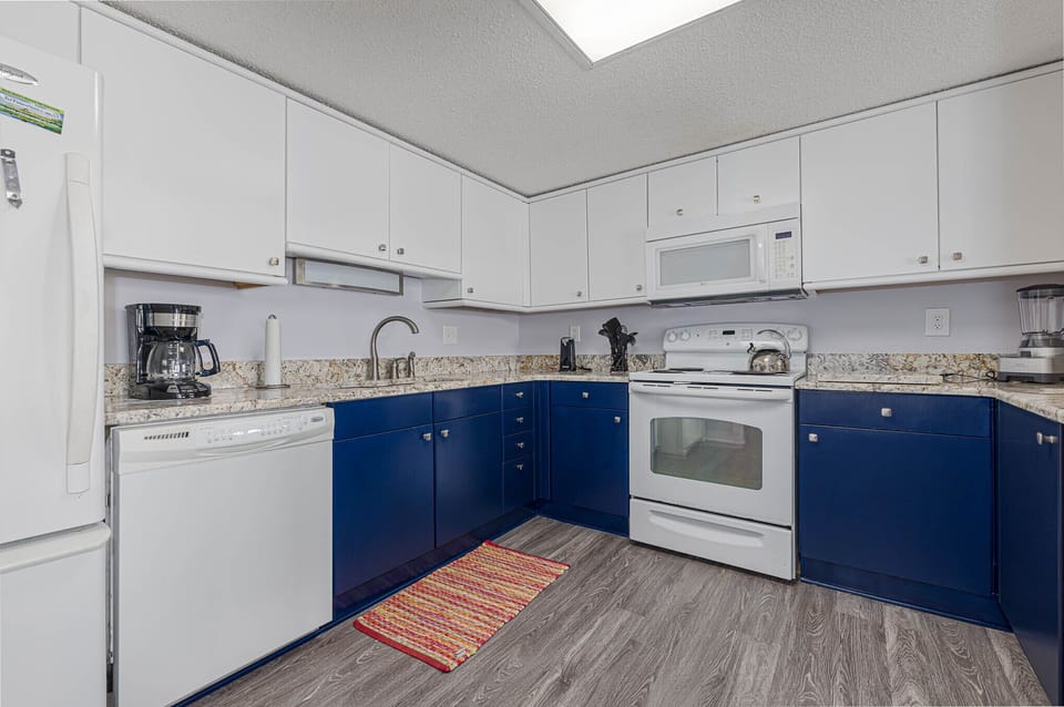Kitchen - Inviting kitchen with all the utensils and cookware you need to make amazing meals.