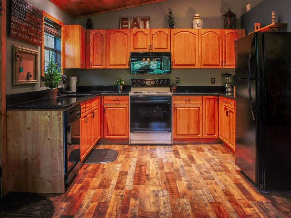 Stocked kitchen with plenty of cabinet and counter space