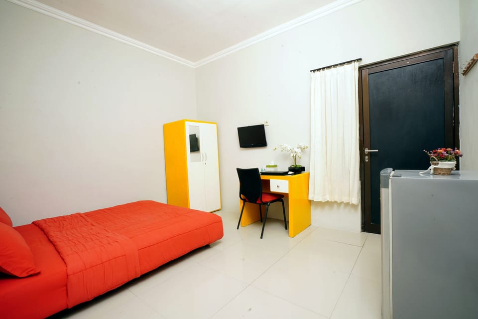 Deluxe Room | Desk, WiFi (free), bed sheets