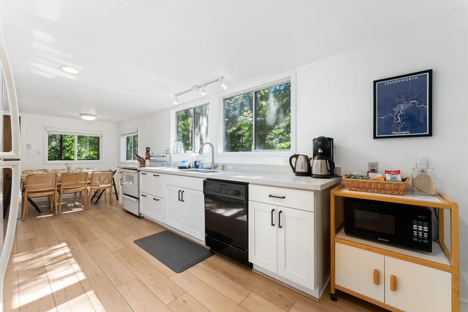 Fully equipped new kitchen with coffee and tea bar provided as an amenity.