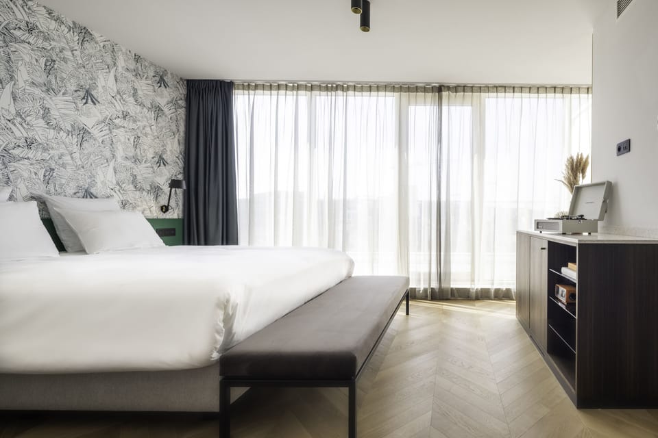 Penthouse Room with Terrace | Premium bedding, minibar, in-room safe, blackout drapes
