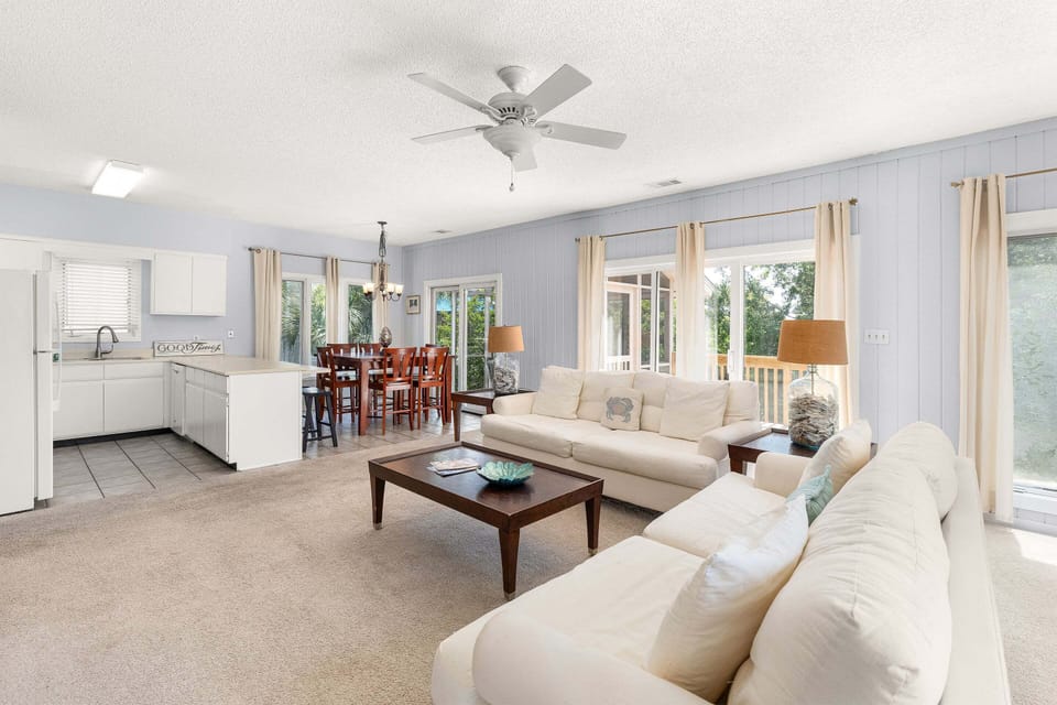 Living room overlooking dining area and kitchen