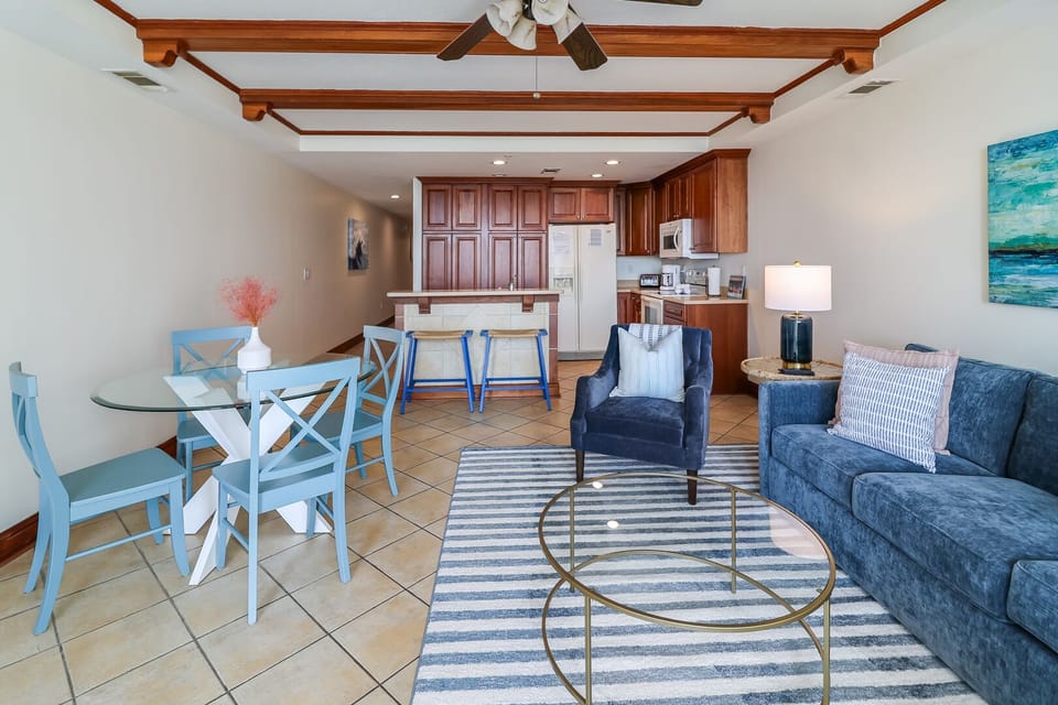 Open floor plan showing living room, dining area, and kitchen
