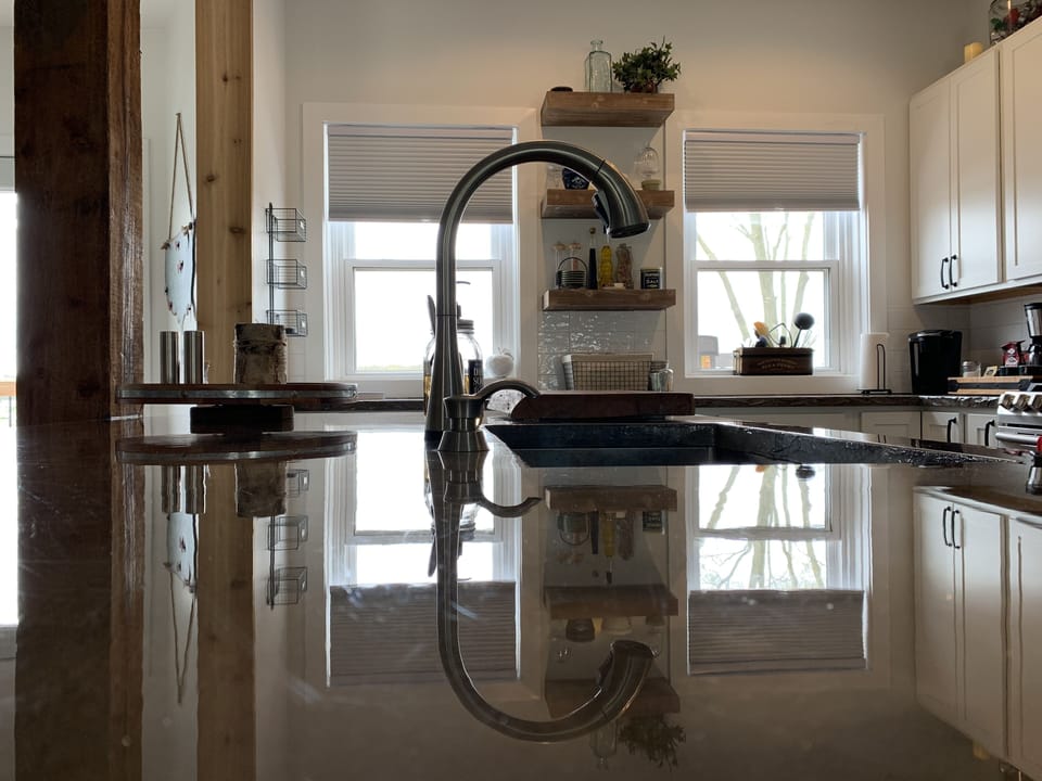Touch faucet in the island that seats 5.