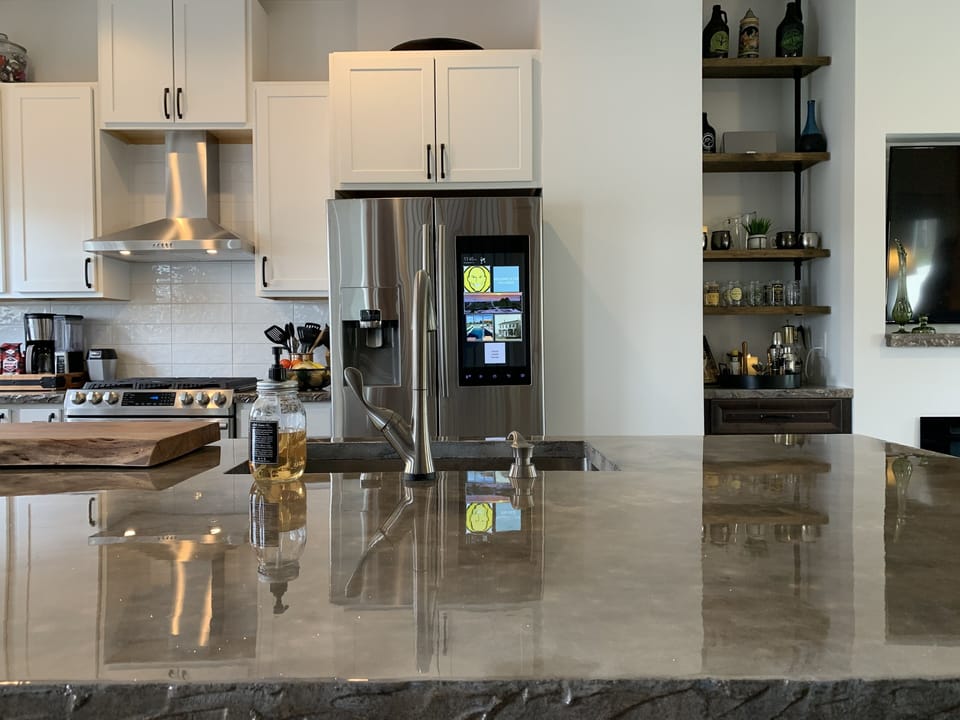 Concrete counters with smart appliances.