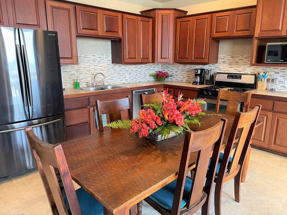 Large kitchen with dishwasher and other amenities.