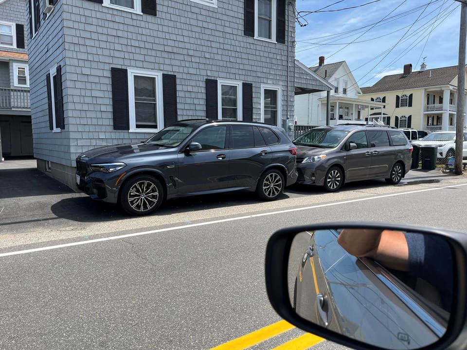 Parking for two cars (front to back) along Atlantic Ave and to the side of house