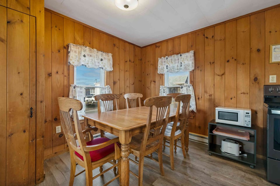Kitchen with table and microwave