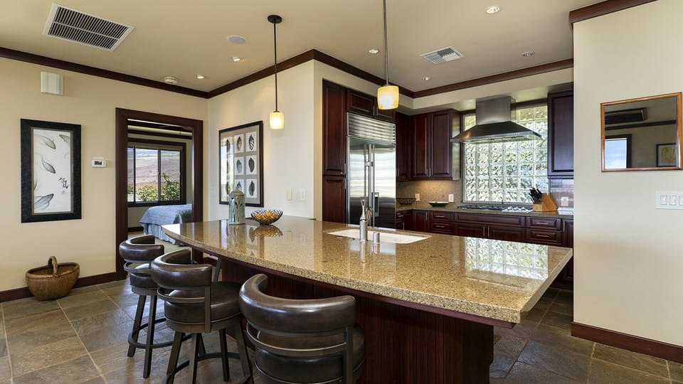 Wolf kitchen appliances include gas range which is rare for this island