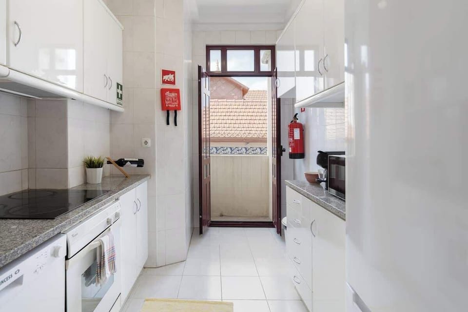 Cook all your meals at this well equiped kitchen and let the bright in with this large door
