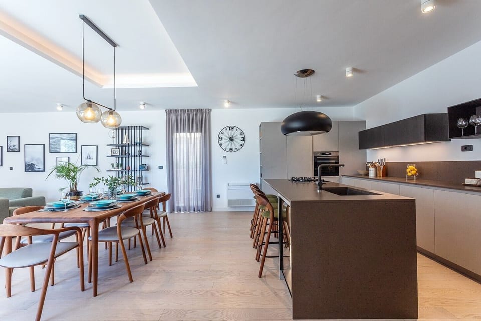 A fully equipped kitchen with all the amenities a modern guest needs for a very comfortable stay (vine cooler, Nespresso, Microwave..)