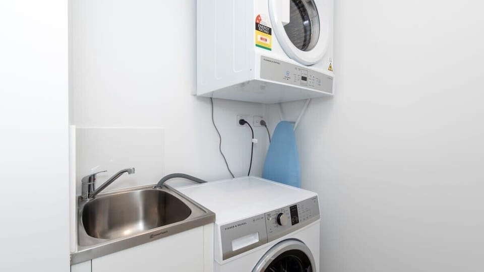 Separate Laundry w Dryer and front loader washing machine