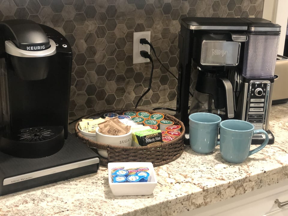 K-cups, tea bags, raw sugar, Splenda, vanilla & half n half creamer cups