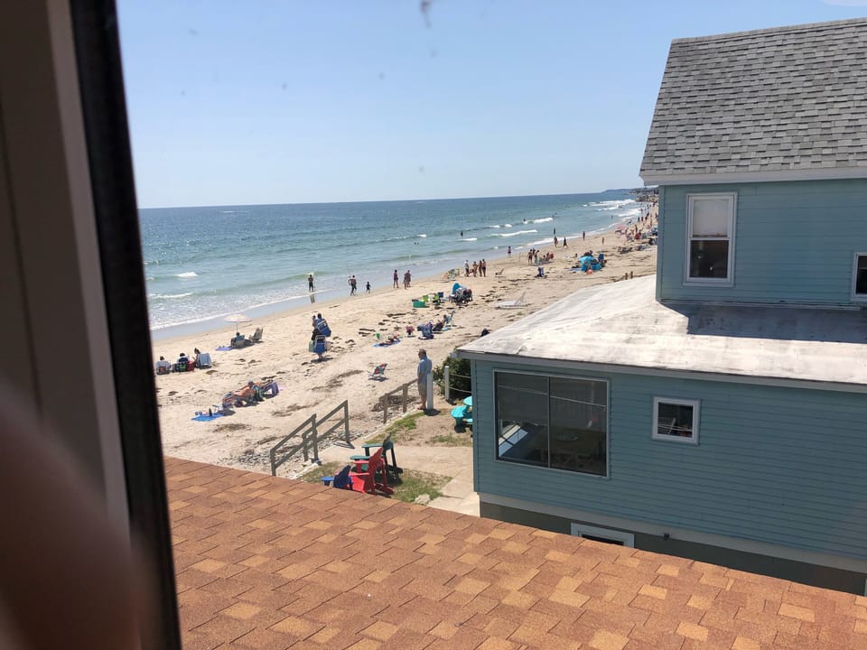 Side bedroom window view of ocean and beach. You couldn't be any closer.