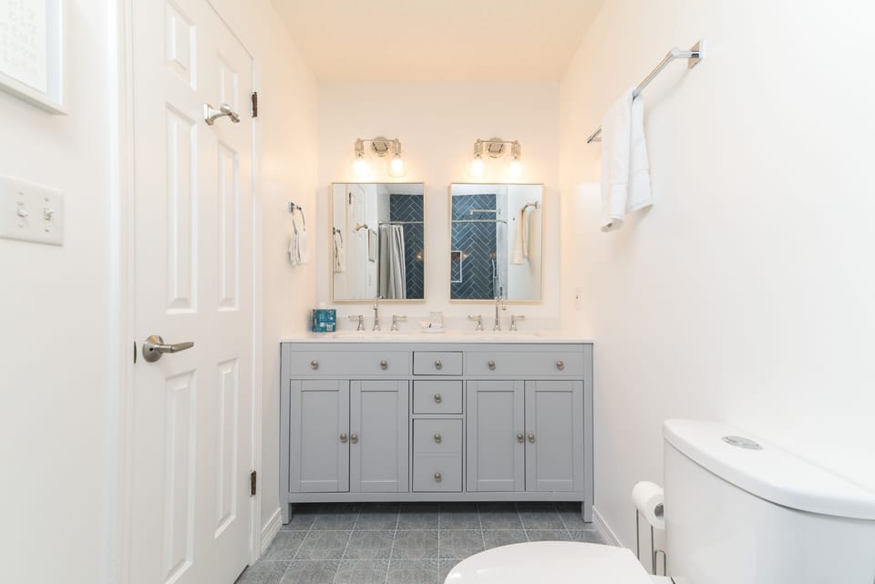 Master bath upstairs, with double vanity, beautiful waterfall shower
