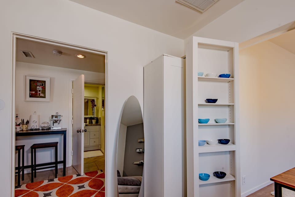office leads to kitchenette and bathroom