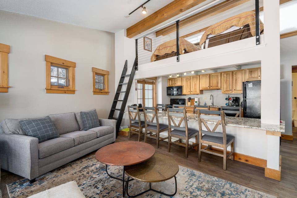 Unique kitchen island has ample seating.