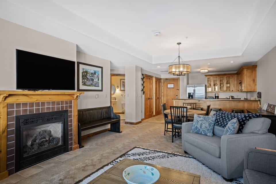 Spacious living area with gas fireplace, cable TV, Roku for streaming services.