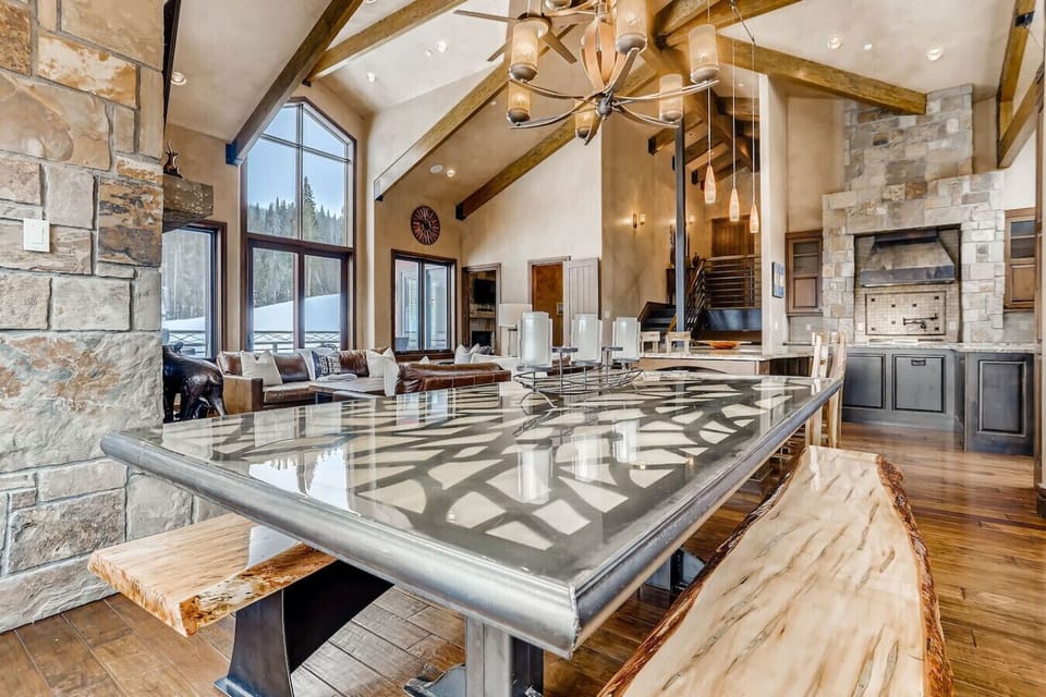 Spacious living room and dining area with stunning mountain views, offering a perfect space for gathering and entertaining.