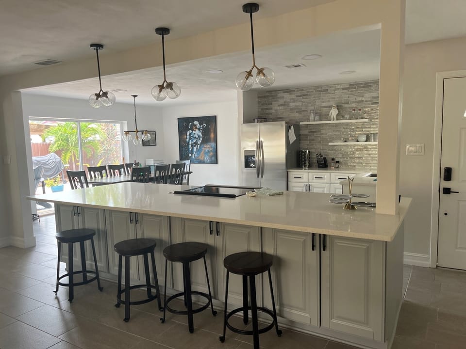 Kitchen opens up to backyard