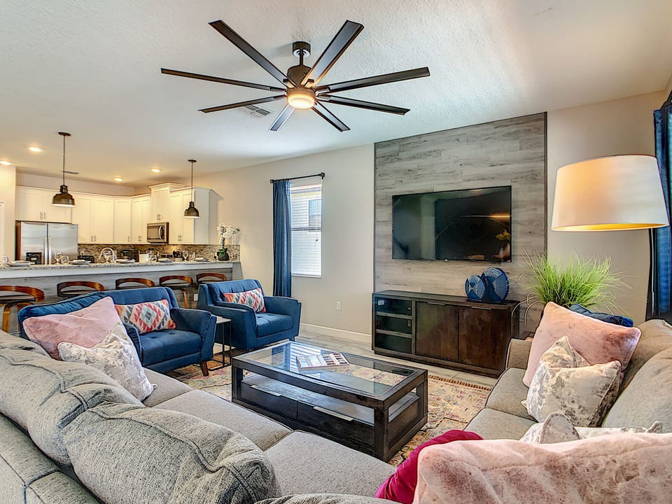 Relax after a long day in our cozy living space. Featuring a 65" Smart TV 