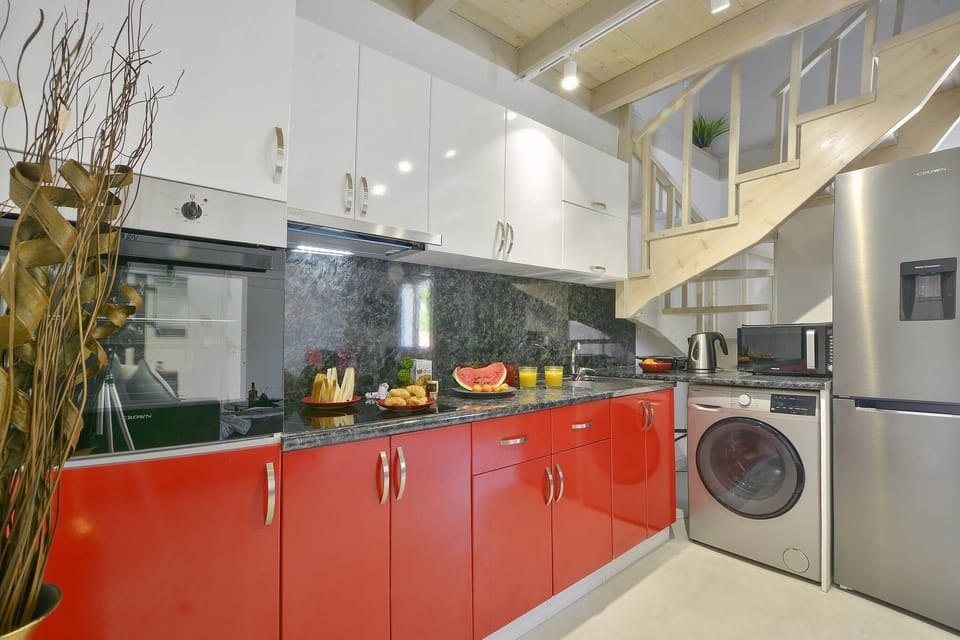 Villa | Private kitchen | Fridge, microwave, oven, stovetop