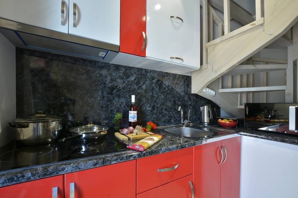 Villa | Private kitchen | Fridge, microwave, oven, stovetop