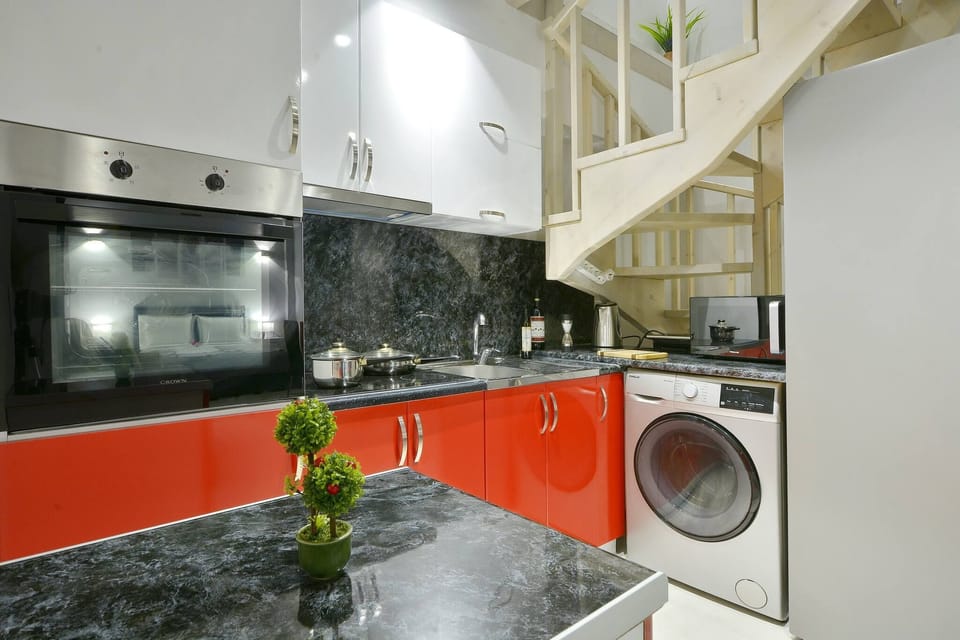 Villa | Private kitchen | Fridge, microwave, oven, stovetop