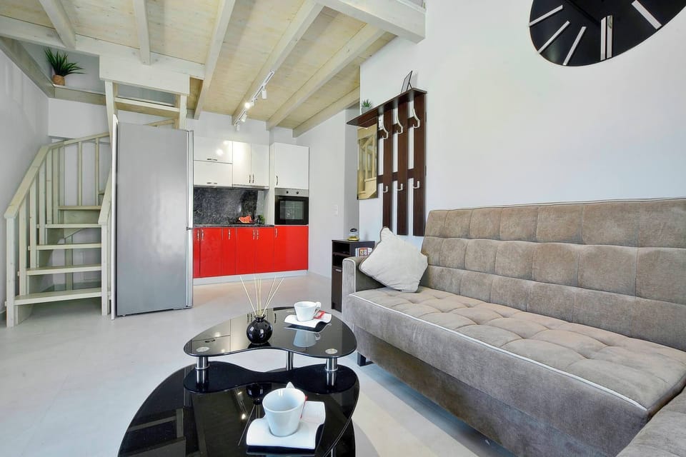 Villa | Living area | 30-inch TV with digital channels