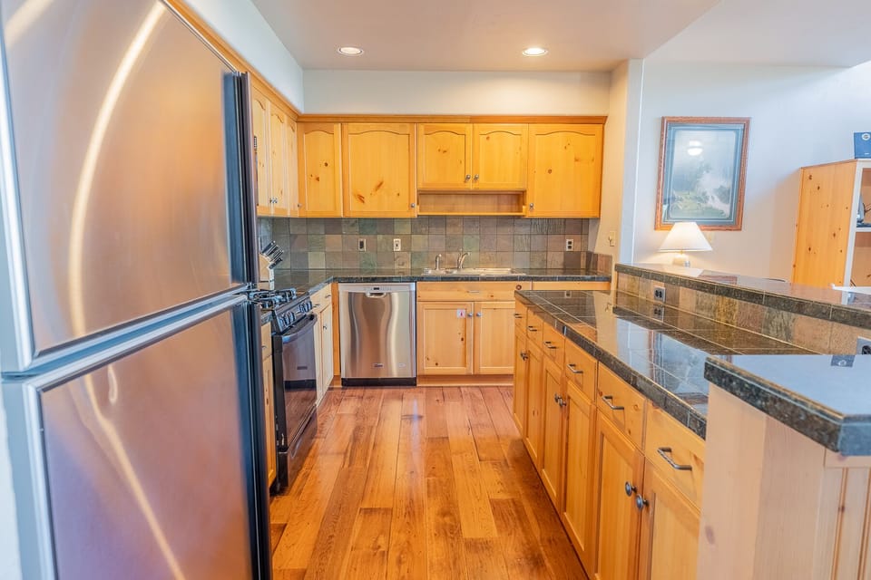 Kitchen- full kitchen with granite countertops