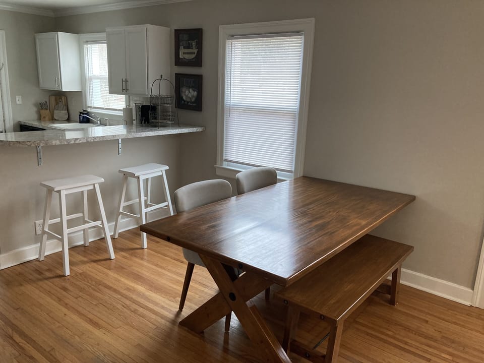 Dining table with bench and 2 comfy upholstered chairs