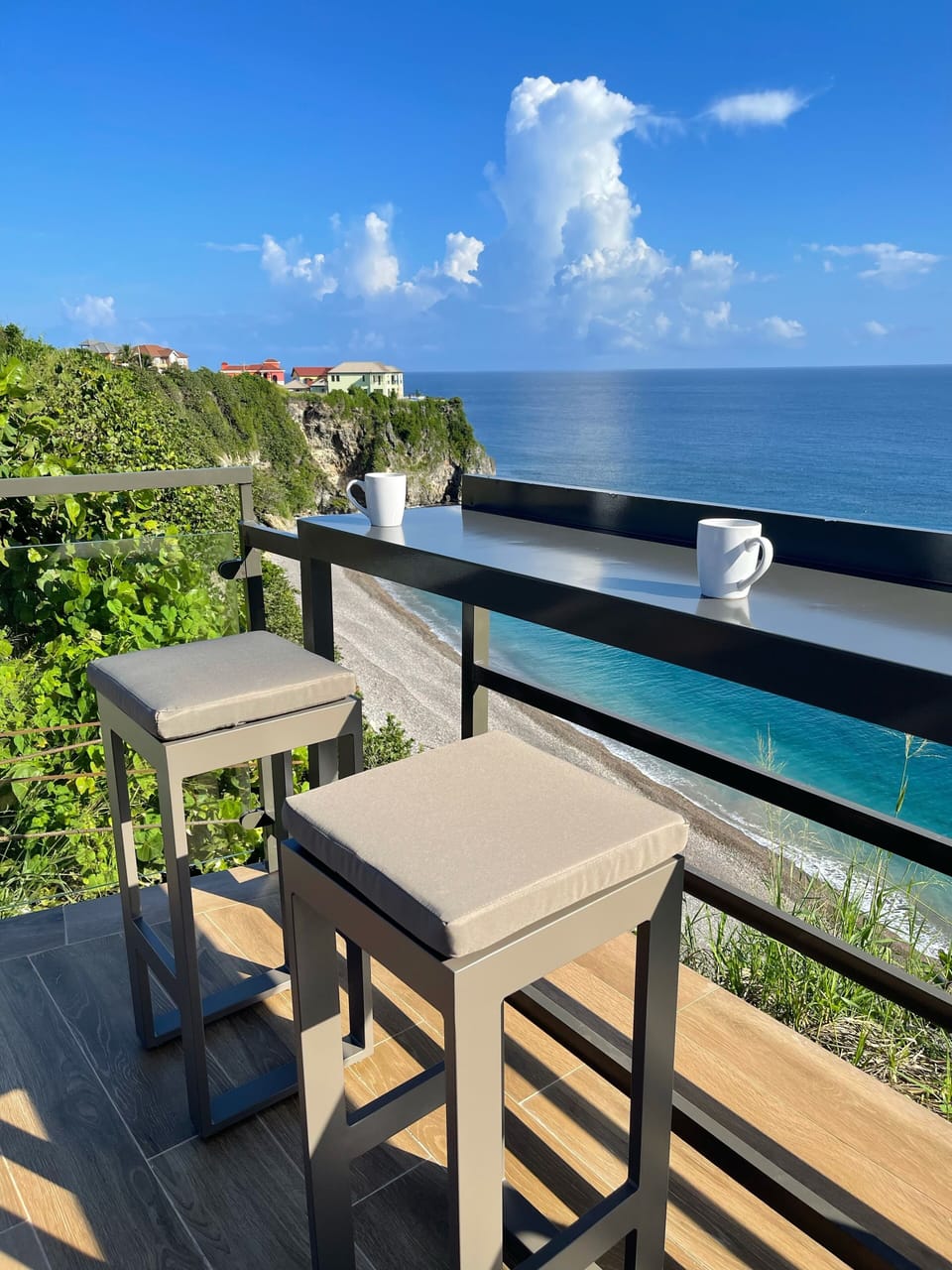 Relax and Unwind while overlooking the Caribbean Sea