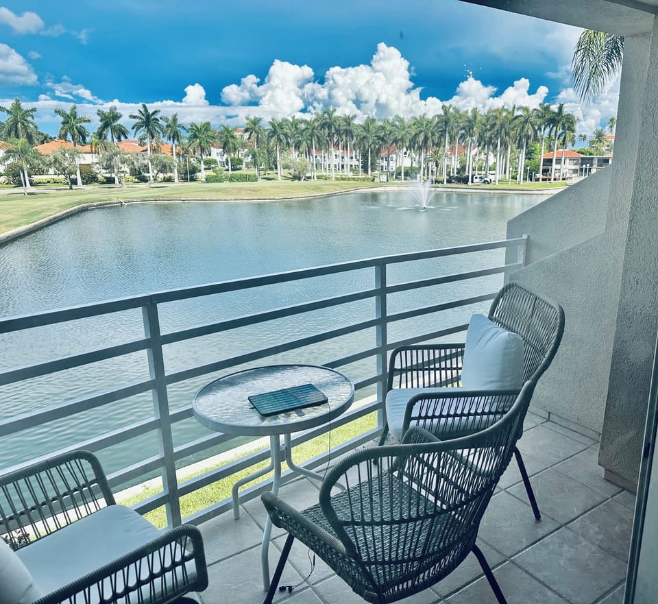 Patio overlooking golf course & lake 