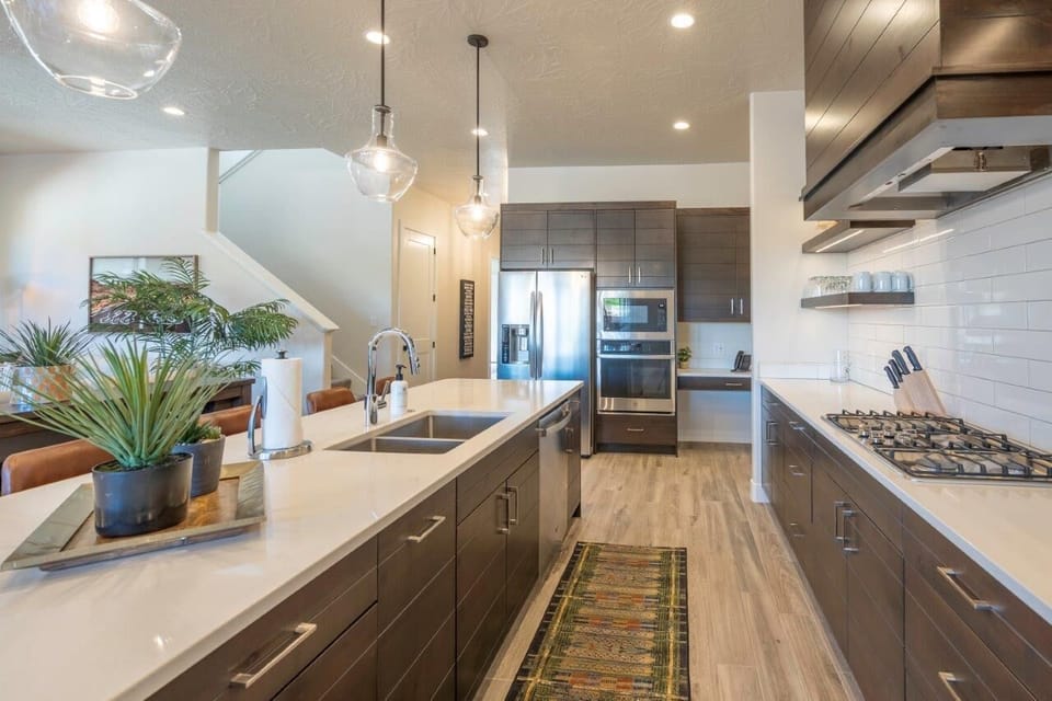Large kitchen with ample counter space and appliances for cooking