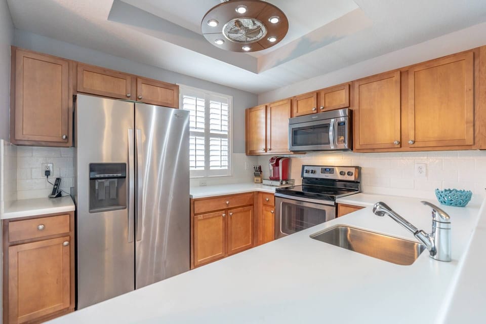 Fully Stocked Kitchen with Stainless Steel Appliances