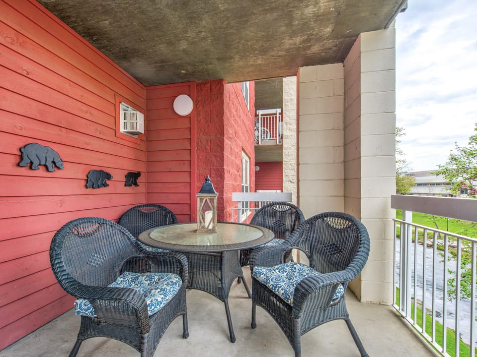 Enjoy the River - Gather ‘round the wicker patio table and enjoy your surroundings from the covered balcony.